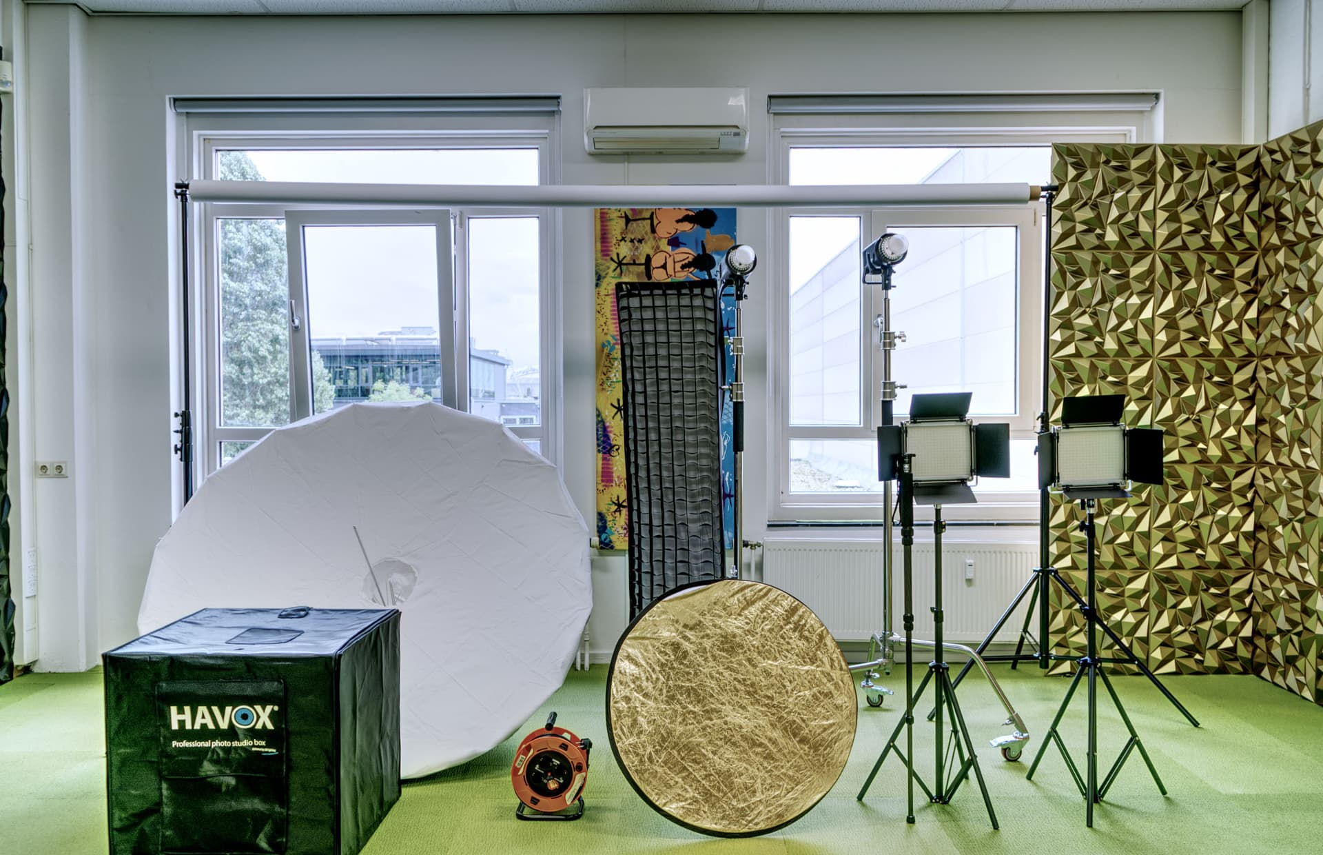 Studio lighting and grip equipment set up at Authentic Social Studio